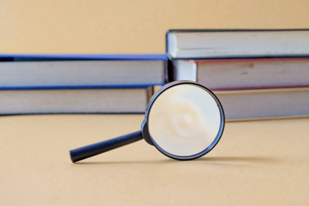 Magnifying Glass with plastic handle On Background.