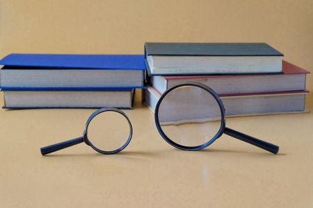 A magnifier glass in different size with plastic handle.の写真素材