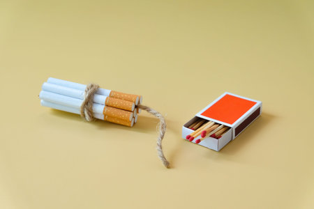 A cigarettes binding with a cord looks like a dynamite.