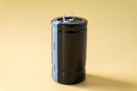 Capacitor, DIY Electronic Parts on color background.