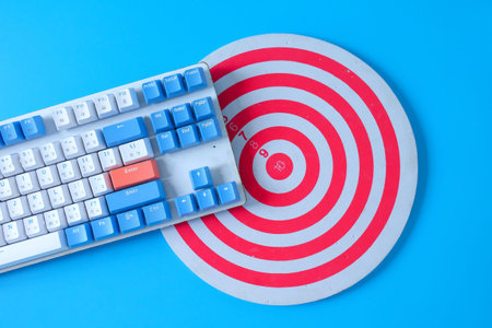 Computer keyboard on drat board game.