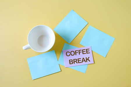 Coffee cup and paper note a round coffee break card.