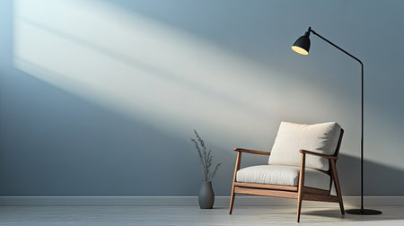 Contemporary chair with a soft cushion, placed beside a floor lamp, blank space for text.の素材