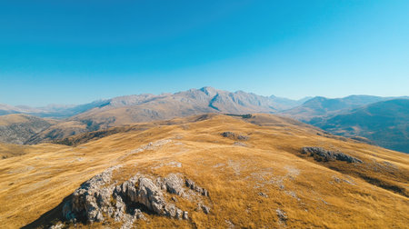 Top view of a mountain plateau with clear blue sky, ideal for adding copyの素材