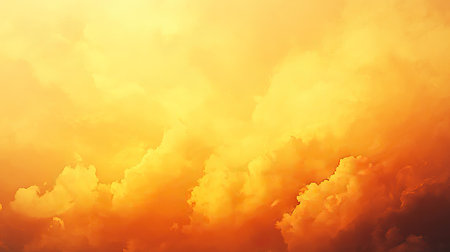 A warm, golden sunset sky background, providing a serene and beautiful backdrop for nature-themed designsの素材