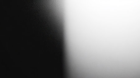 Top view of a black and white gradient with ample copy space on the left side.の素材