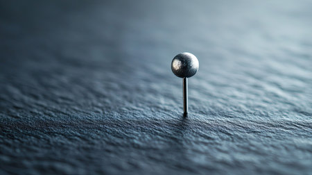 Close-up of a pin on a surface, with ample copy space available, showcasing detail and sharpnessの素材
