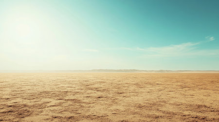 A barren desert expanse with minimal vegetation and textured sand, great for copy space. No peopleの素材