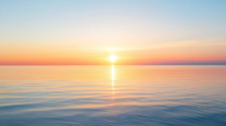 Early morning sun rising over a calm horizon, casting light and shadows with ample copy space. No people, tranquil settingの素材