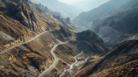 A stunning top view of a South Asian mountain pass, with winding roads cutting through the rugged terrain.の素材