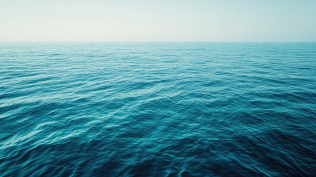 A beautiful, serene view of the sea beneath the European coastline. Clear blue water with open copy space for text.の素材