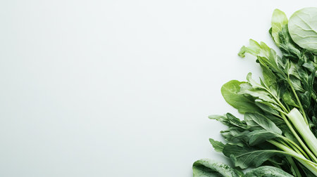 Green veggies on a clean, white background. Ample space for your message in the copy spaceの素材