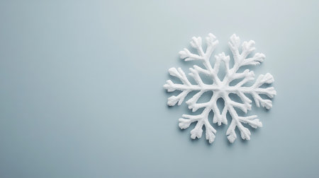 Top view of large, isolated snowflake on clear background with copy spaceの素材