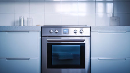 A modern kitchen scene showcasing a stainless steel oven, blending sophisticated design with practical functionality, ideal for home chefs and culinary enthusiasts alike.の素材