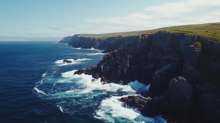 Experience the breathtaking beauty of coastal cliffs meeting azure waves in this aerial view, showcasing nature's grandeur and tranquil scenery. Perfect for travel inspiration!の素材
