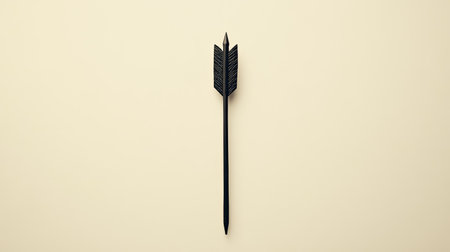 This minimalist image features a black arrow on a soft light background, representing direction, focus, and creativity for various design and marketing concepts.の素材