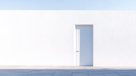 A minimalist image featuring a white door set against a blank wall beneath a clear blue sky. This scene captures simplicity and modern design elements.の素材