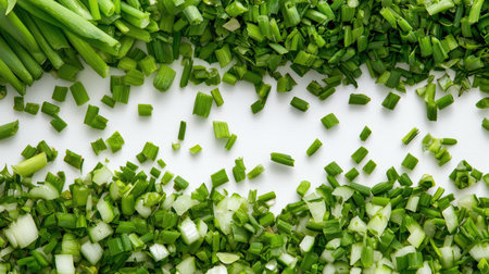 Freshly chopped green onions arranged on a bright background showcase the vibrant colors and textures ideal for various culinary applications. Perfect for recipes and food photography.の素材
