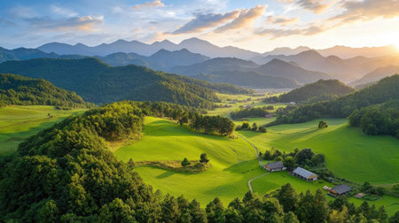 This breathtaking image showcases rolling green hills and majestic mountains under a beautiful sunset, offering a peaceful and tranquil nature scene.の素材