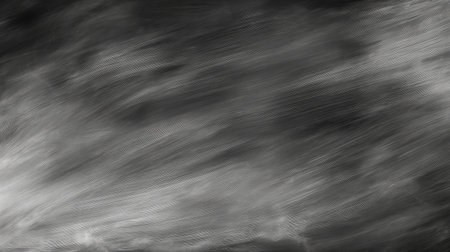 This abstract black and white background features soft textures and shifting patterns that create an elegant, modern aesthetic ideal for design projects.の素材