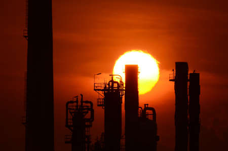 Silhouette oil refinery at sunrise  , super teleの写真素材