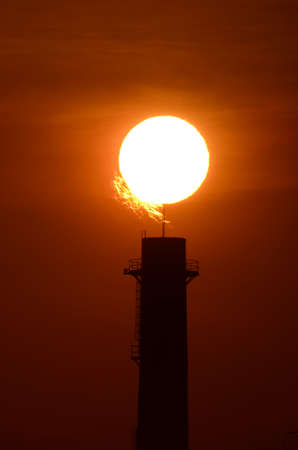 Silhouette oil refinery at sunrise  , super teleの写真素材