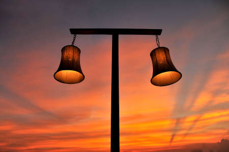 lamp on sky with sunset in the eveningの写真素材