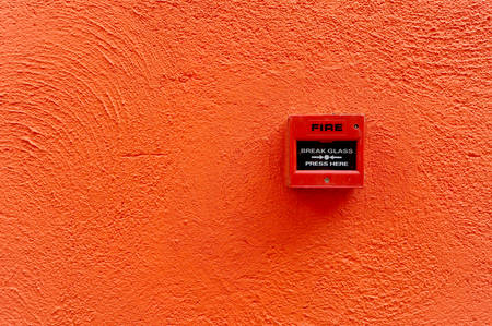 fire alarm switch on the wall
