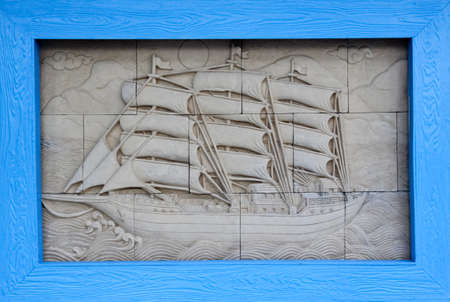 sculpted white stone with carved walls, statues row and archs; detail of the carved wall  the famous portuguese boat  caravela のeditorial素材