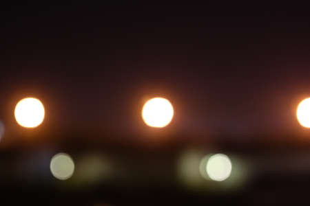 Colourful defocused lights on dark background