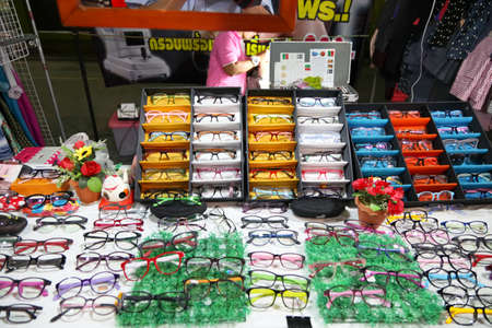Chonburi, THAILAND - March 17, 2015: 
eye glasses shop at the night market on MARCH 17, 2015 in Chonburi, Thailand.のeditorial素材