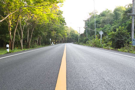 Empty of asphalt road in the countryside of Thailand, shallow focusedの写真素材