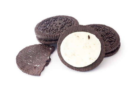 Chocolate cookies with cream filling isolated on white background.の写真素材