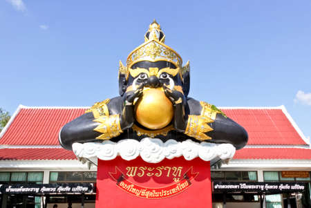 CHACHOENGSAO, THAILAND - 9 November 2014 : Rahu the mythical of Darkness at Wat Saman Rattanaram. He has half body, but invisible. The statue pose is the giant swallow the moon for the eclipseのeditorial素材