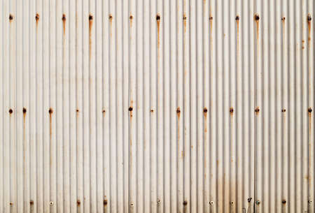 A rusty corrugated iron metal texture , can use for backgroundの写真素材