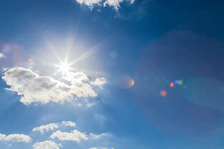 Cloud in blue sky and sun for background.の写真素材