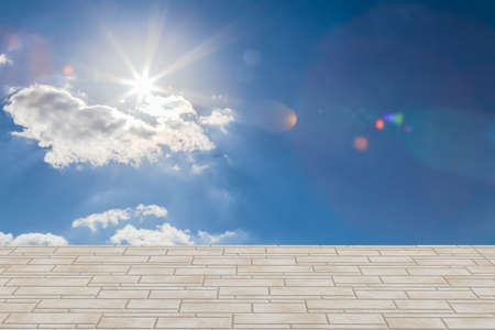 Cloud in blue sky and sun for background.の写真素材