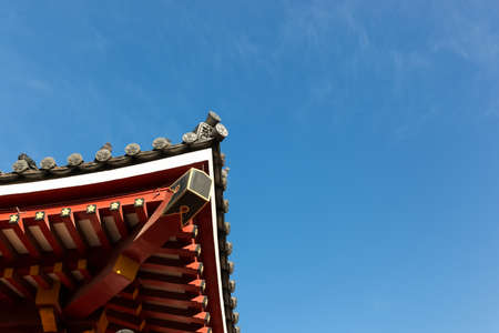 Japan style tile roof with blue sky.の写真素材