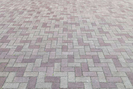 Abstract tile pavement patterns as a background.