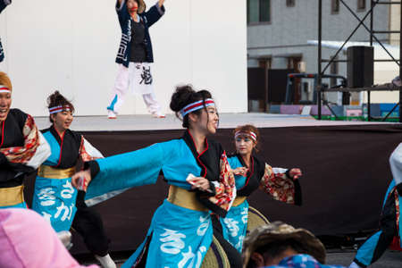 Aichi, JAPAN - August 6, 2016: Anjo Tanabata festival., Japanese girls in colorful kimono dance at Anjo Tanabata Festival celebrations in Aichi on August 6th 2016.,evening time in motion blurのeditorial素材