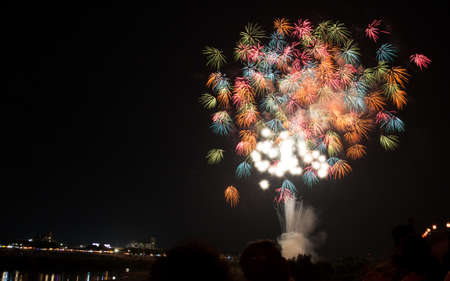 Colorful fireworks of various colors over night sky