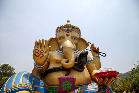 Kanchanaburi, THAILAND - April 16, 2015 :Ganesha statue the Hindu god that whose head is an elephant head at Temple in Kanchanaburi, Thailand. He is a god of knowledge and success.のeditorial素材