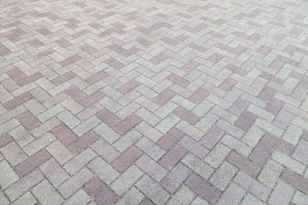 Abstract tile pavement patterns as a background.