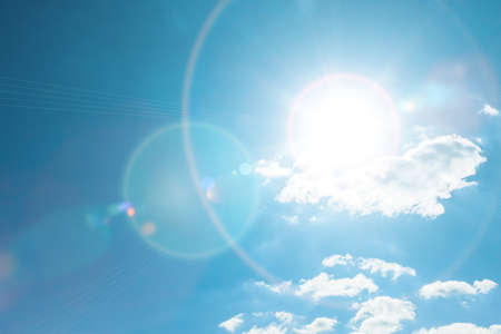 Cloud in blue sky and sun for background.の写真素材