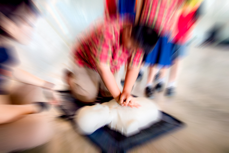 Education of emergency training rescuer CPR, Training for safe life, First aid health care, Subject is blurry, too soft, Zoom effect.の写真素材
