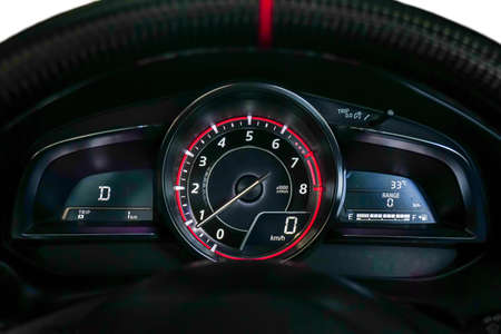 Speedometer and steering wheel,Mileage,Closeup dashboard of mileage car , Modern light car and New display of modern car.の写真素材