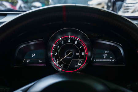 Speedometer and steering wheel,Mileage,Closeup dashboard of mileage car , Modern light car and New display of modern car.の写真素材