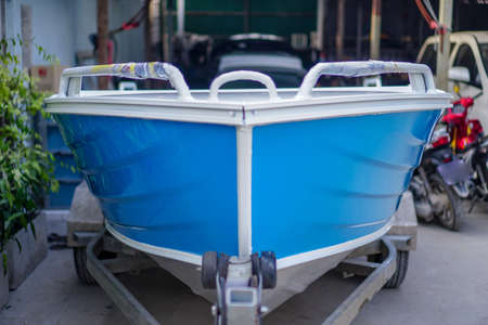 Paint the boat in blue and white.の写真素材