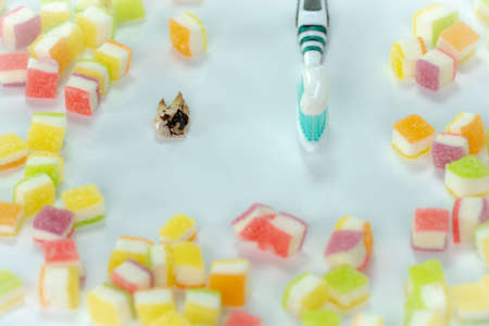 Sugar and lollipop cause tooth decay ,sweets make tooth decayの写真素材