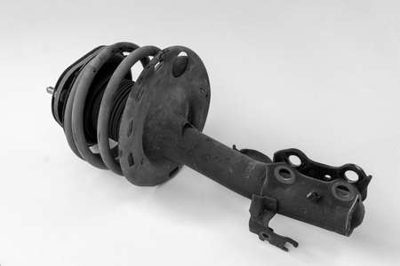 Old shock absorber for front wheels of motor vehicles, isolatedの写真素材